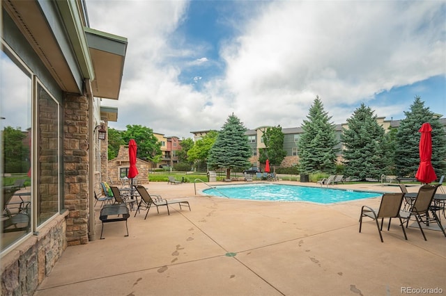 13456 Via Varra Unit 225, Broomfield, CO 80020 - community pool with a patio area