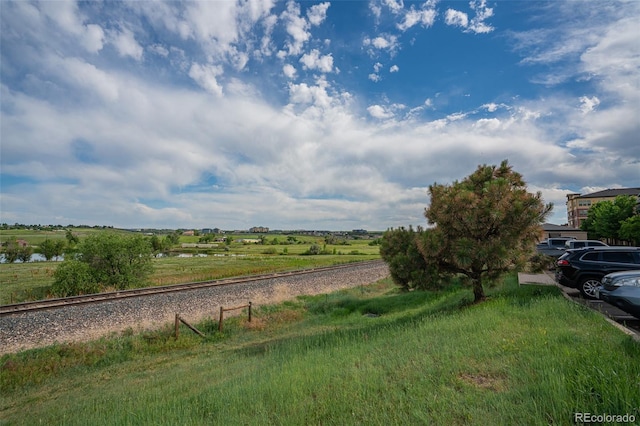 13456 Via Varra Unit 225, Broomfield, CO 80020 - view of yard featuring a rural view