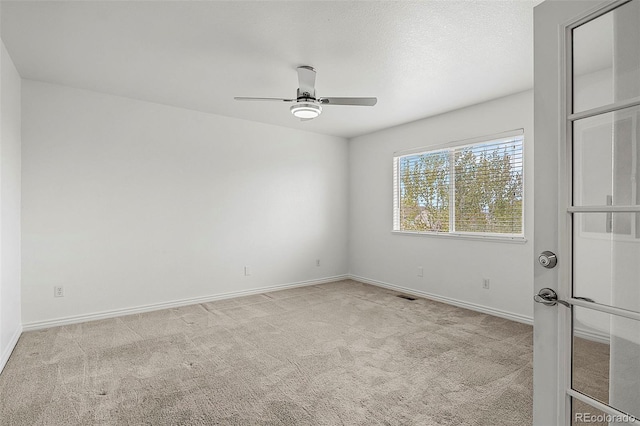 750 Capeglen Rd, Colorado Springs, CO 80906 - spare room with carpet flooring, a ceiling fan, and baseboards