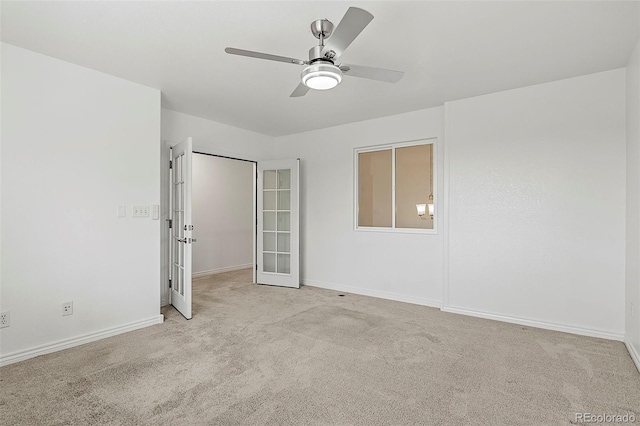 750 Capeglen Rd, Colorado Springs, CO 80906 - unfurnished bedroom featuring carpet flooring, french doors, baseboards, and ceiling fan