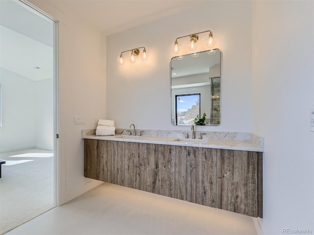 bathroom featuring double vanity