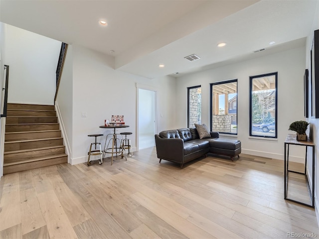 living room featuring light wood-type flooring