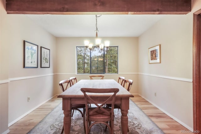 510 Silhouette Way, Monument, CO 80132 - dining room with a chandelier and light wood-style flooring