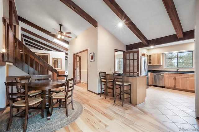 510 Silhouette Way, Monument, CO 80132 - dining space with a ceiling fan, stairs, and light wood-type flooring