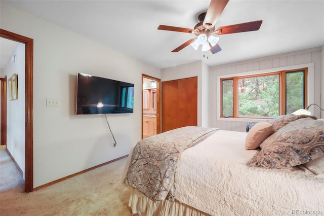 510 Silhouette Way, Monument, CO 80132 - bedroom with light carpet, connected bathroom, a closet, and a ceiling fan