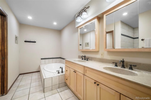 510 Silhouette Way, Monument, CO 80132 - bathroom with double vanity, a garden tub, tile patterned floors, and recessed lighting