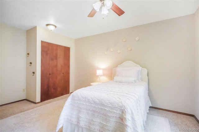 510 Silhouette Way, Monument, CO 80132 - bedroom featuring light colored carpet, a closet, and ceiling fan