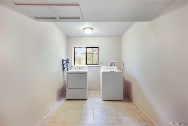 510 Silhouette Way, Monument, CO 80132 - laundry room featuring washer and dryer, attic access, and light tile patterned floors