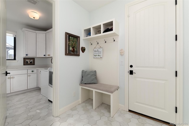 mudroom with washer / dryer