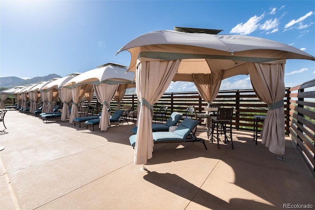 view of patio / terrace with a mountain view