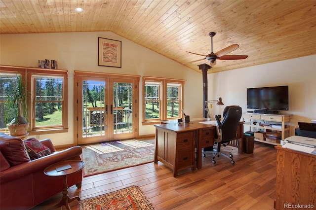 office space with lofted ceiling, light hardwood / wood-style flooring, wooden ceiling, and french doors