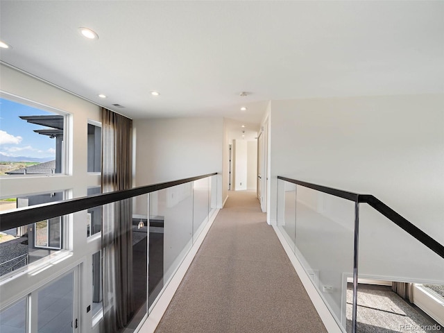 corridor with carpet floors