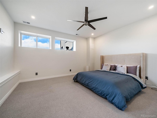 carpeted bedroom featuring ceiling fan