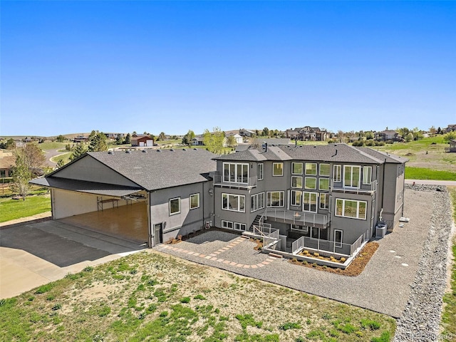 view of front of property featuring cooling unit