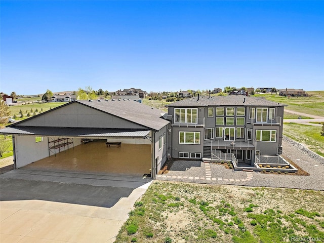 view of front facade with a carport