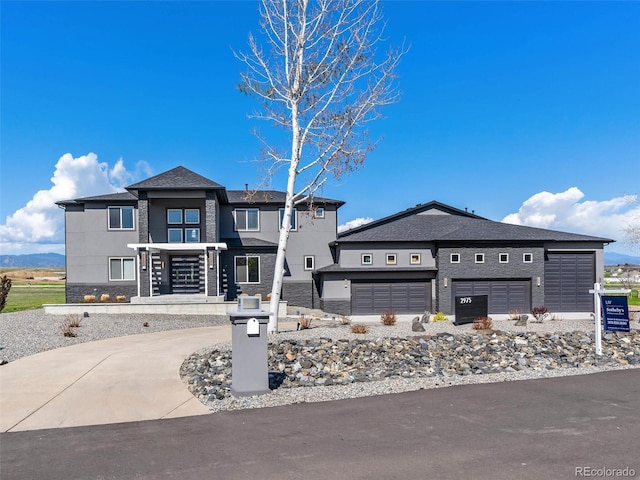 view of front of property with a garage