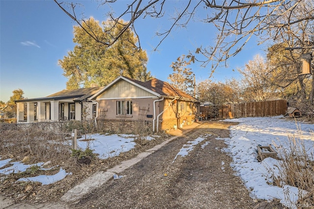 view of snow covered property