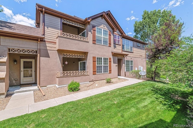 11972 W Long Cir Unit 104, Littleton, CO 80127 - view of front of property with a front yard