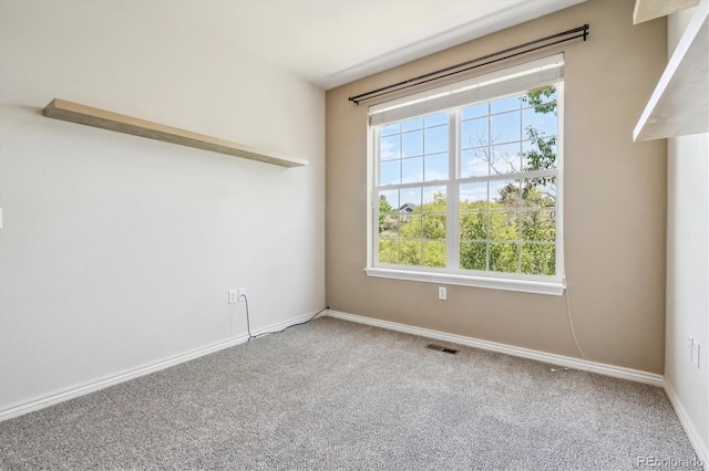 11972 W Long Cir Unit 104, Littleton, CO 80127 - carpeted spare room featuring baseboards