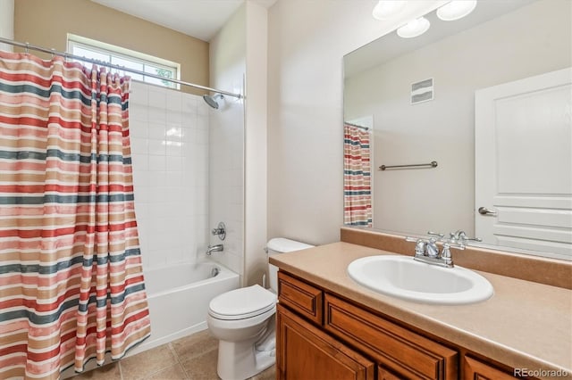 11972 W Long Cir Unit 104, Littleton, CO 80127 - bathroom featuring vanity, tile patterned floors, and shower / bath combo with shower curtain