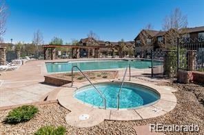 11972 W Long Cir Unit 104, Littleton, CO 80127 - community pool featuring a community hot tub