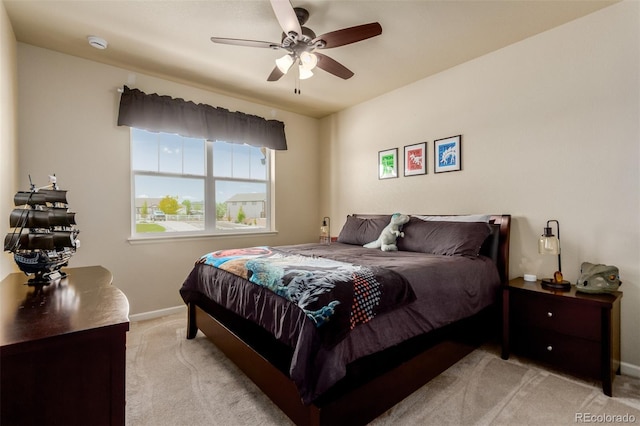 10653 E 163rd Ct, Brighton, CO 80602 - bedroom with light carpet, baseboards, and a ceiling fan