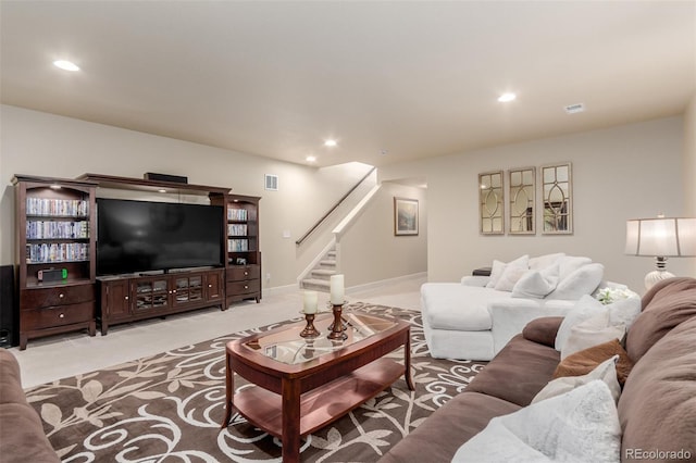10653 E 163rd Ct, Brighton, CO 80602 - living area with stairway, recessed lighting, and light colored carpet
