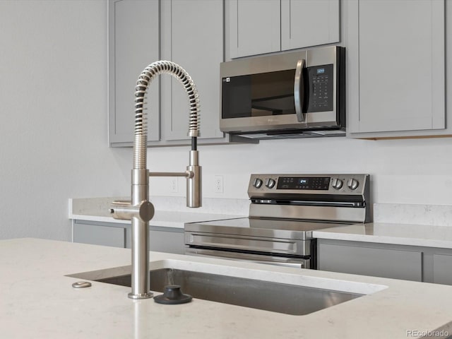 kitchen featuring gray cabinetry