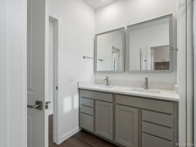 bathroom featuring vanity and hardwood / wood-style floors