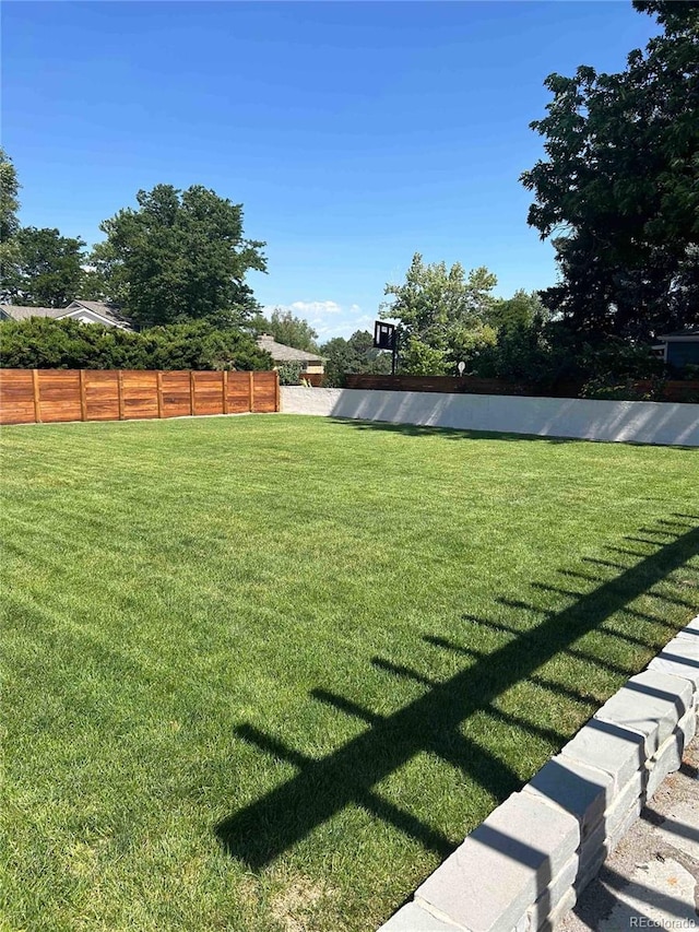 view of yard with fence
