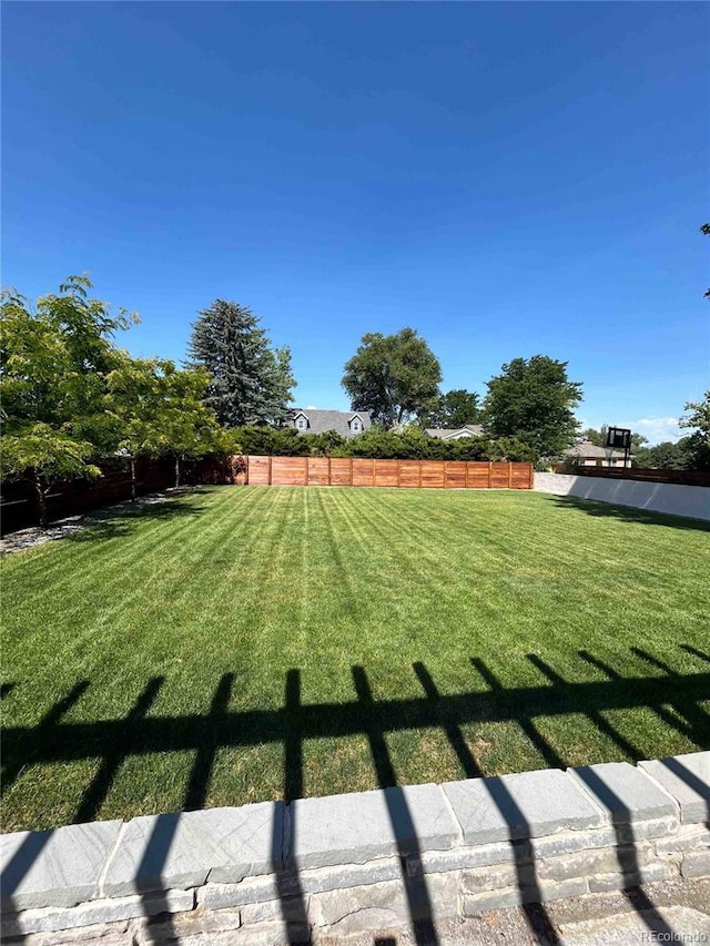 view of yard with fence