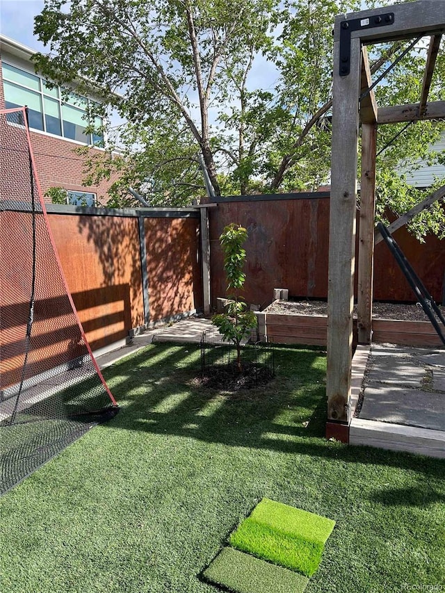 view of yard with fence