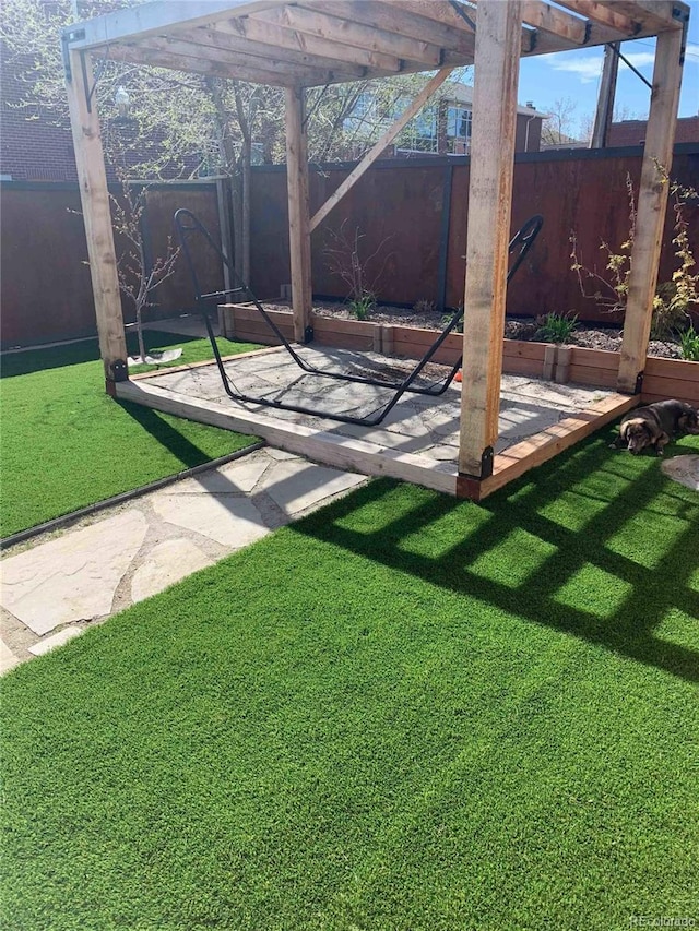 view of yard featuring a fenced backyard