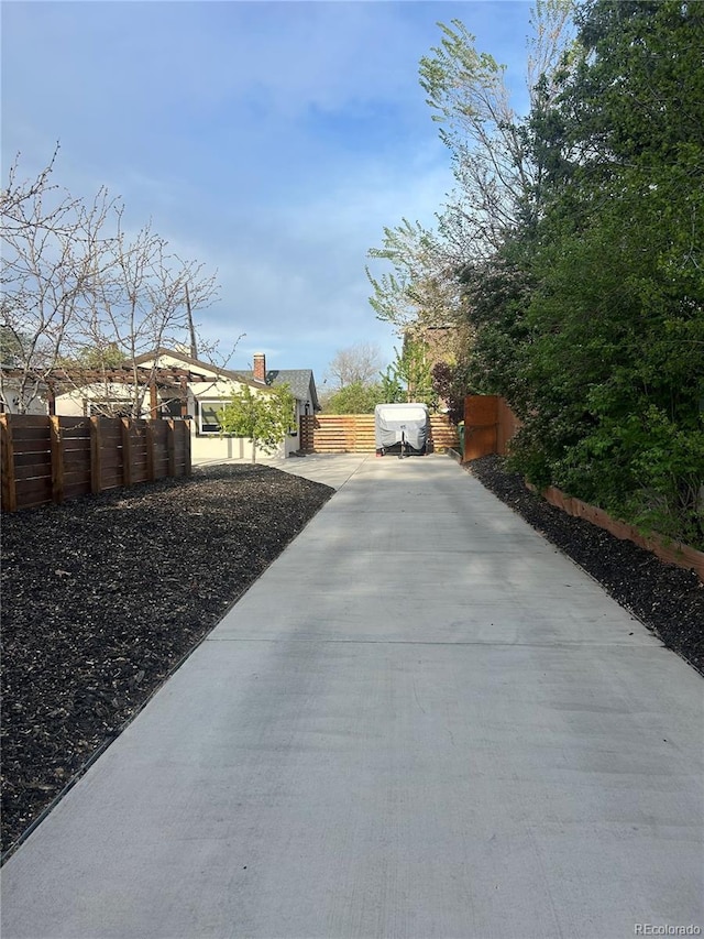 exterior space with concrete driveway