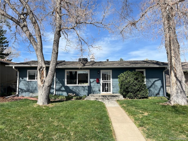 view of front of house with a front yard