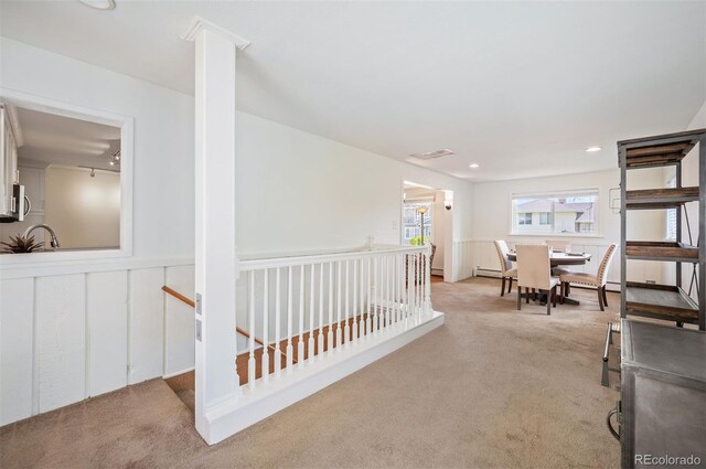 interior space with light colored carpet and recessed lighting