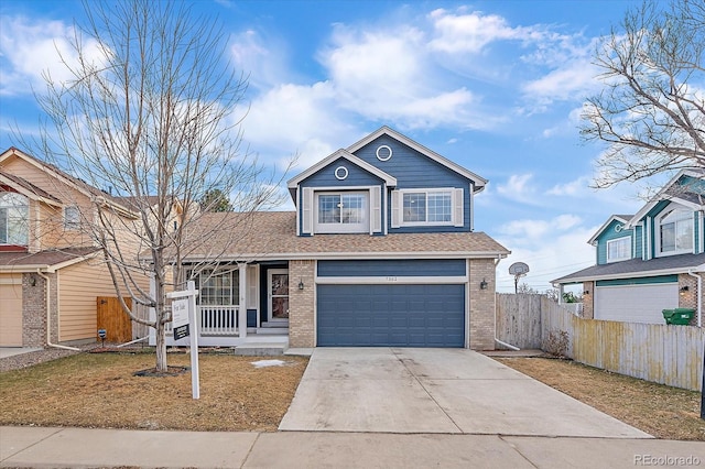 traditional-style house with an attached garage, covered porch, brick siding, fence, and concrete driveway