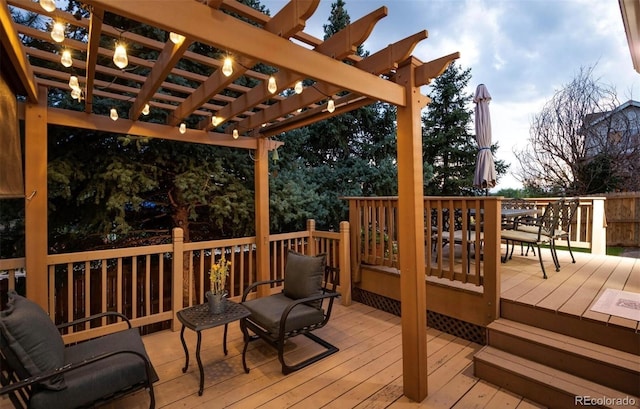 wooden terrace with outdoor dining space and a pergola