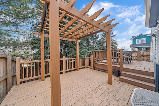 wooden deck featuring a pergola