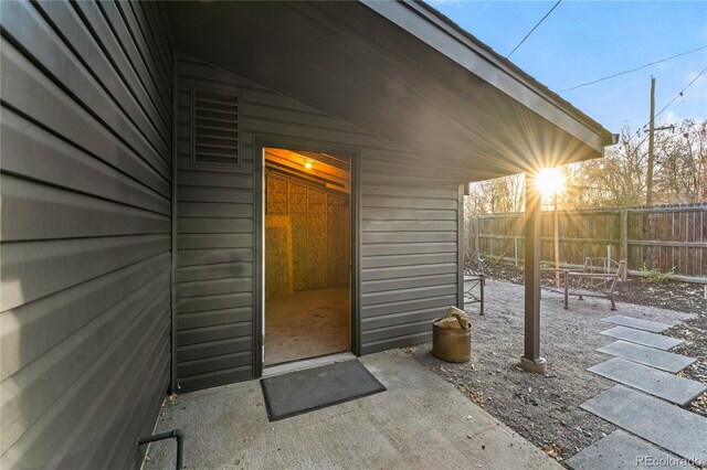 8120 W 54th Pl, Arvada, CO 80002 - property entrance featuring a patio area