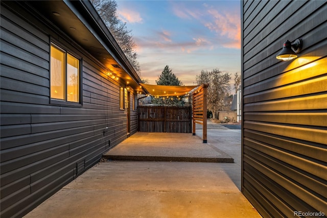 8120 W 54th Pl, Arvada, CO 80002 - view of side of property with a patio