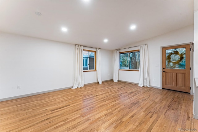 8120 W 54th Pl, Arvada, CO 80002 - entryway featuring light wood-style flooring, recessed lighting, baseboards, and vaulted ceiling