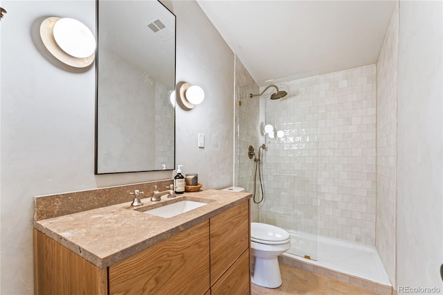 8120 W 54th Pl, Arvada, CO 80002 - full bath with toilet, vanity, and tiled shower