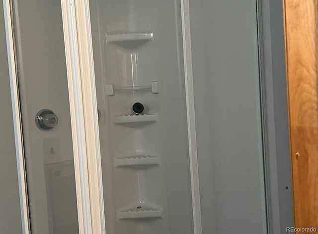 interior details with a shower