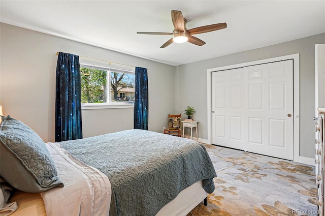6655 S Elm Cir, Centennial, CO 80121 - bedroom with baseboards, a closet, a ceiling fan, and light colored carpet
