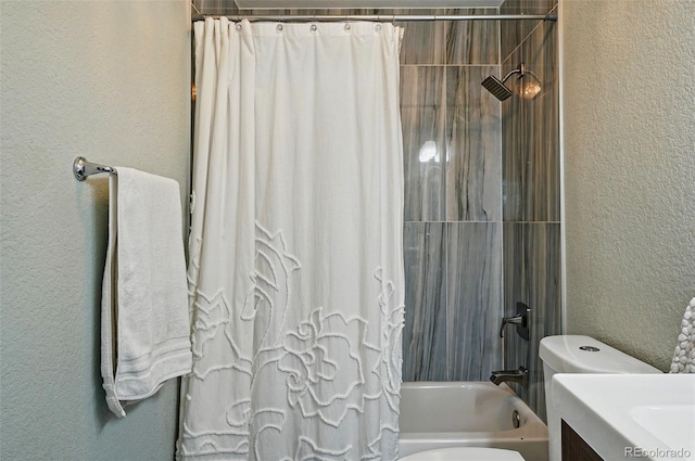 6655 S Elm Cir, Centennial, CO 80121 - full bathroom with a textured wall, shower / bath combo, toilet, and vanity