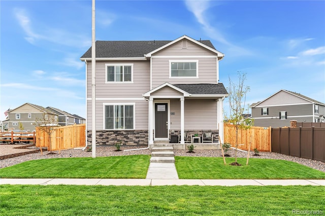 view of front of home with a front lawn