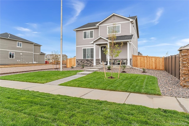 view of front of home with a front yard