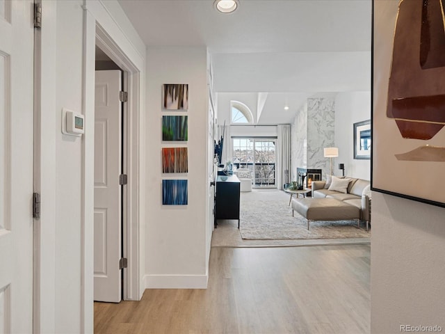 hallway with light wood-type flooring