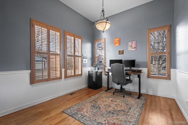 office area featuring light hardwood / wood-style flooring and a healthy amount of sunlight